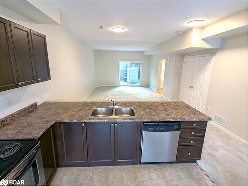 1 & 2-175 Stanley Street Street, Barrie, ON - Indoor Photo Showing Kitchen With Double Sink