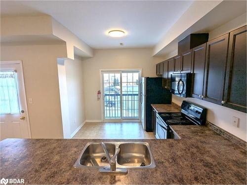 1 & 2-175 Stanley Street Street, Barrie, ON - Indoor Photo Showing Kitchen With Double Sink