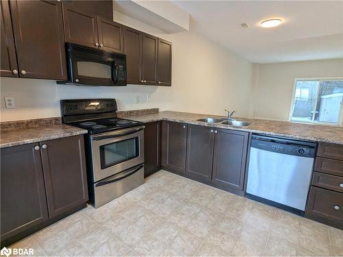 1 & 2-175 Stanley Street Street, Barrie, ON - Indoor Photo Showing Kitchen With Double Sink