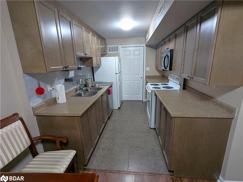 1 & 2-175 Stanley Street Street, Barrie, ON - Indoor Photo Showing Kitchen With Double Sink