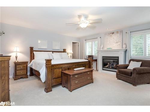 6 Orsi Court, Barrie, ON - Indoor Photo Showing Bedroom With Fireplace