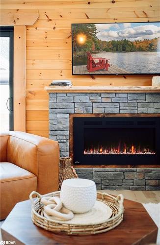 107 Revell Street, Gravenhurst, ON - Indoor Photo Showing Other Room With Fireplace