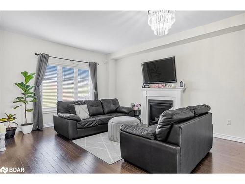 12 Cypress Point, Barrie, ON - Indoor Photo Showing Living Room With Fireplace