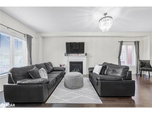 12 Cypress Point, Barrie, ON - Indoor Photo Showing Living Room With Fireplace