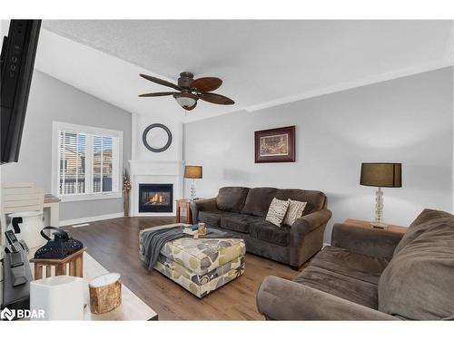 1112 Kell Street, Innisfil, ON - Indoor Photo Showing Living Room With Fireplace