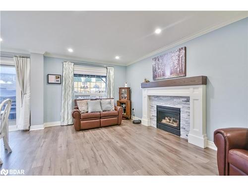 22 Emms Drive, Barrie, ON - Indoor Photo Showing Living Room With Fireplace