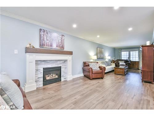 22 Emms Drive, Barrie, ON - Indoor Photo Showing Living Room With Fireplace