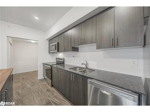 613-15 Kneeshaw Drive, Barrie, ON - Indoor Photo Showing Kitchen With Double Sink