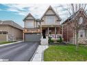 19 Rugman Crescent, Springwater, ON  - Outdoor With Facade 