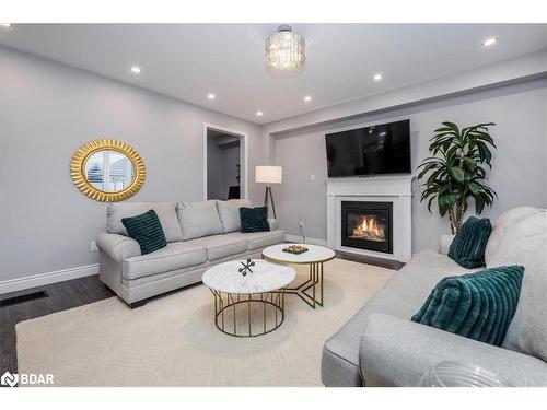 19 Rugman Crescent, Springwater, ON - Indoor Photo Showing Living Room With Fireplace