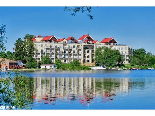 401-140 Cedar Island Road, Orillia, ON - Outdoor With Body Of Water With Facade