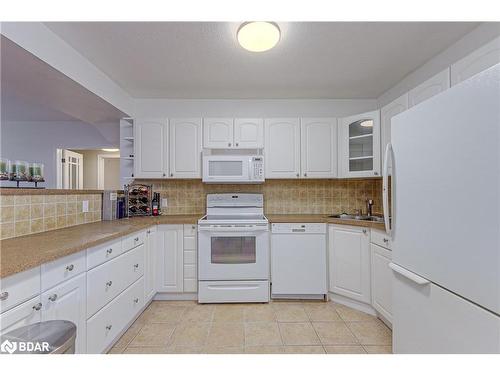 1104 Alfred Street, Innisfil, ON - Indoor Photo Showing Kitchen With Double Sink