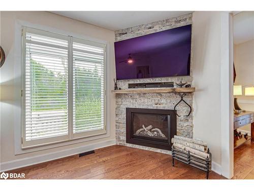 1104 Alfred Street, Innisfil, ON - Indoor Photo Showing Living Room With Fireplace