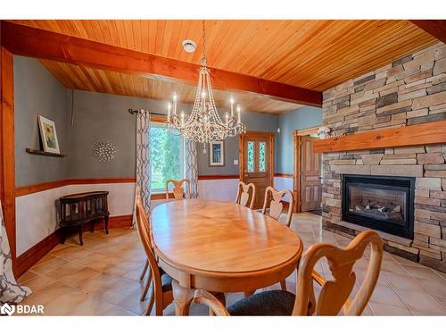 8464 6Th Line, Essa, ON - Indoor Photo Showing Dining Room With Fireplace