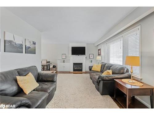 219 Steel Street, Barrie, ON - Indoor Photo Showing Living Room With Fireplace