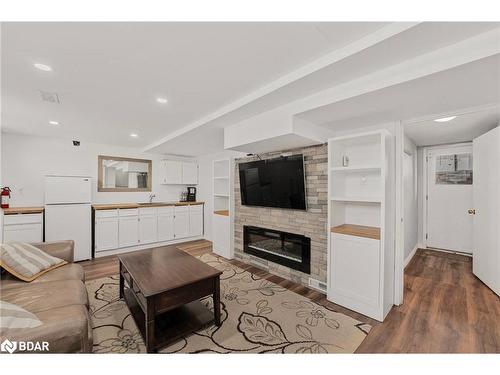 219 Steel Street, Barrie, ON - Indoor Photo Showing Living Room With Fireplace