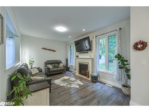 27 Atlantis Drive, Orillia, ON - Indoor Photo Showing Living Room With Fireplace