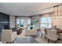 303-131 Clapperton Street, Barrie, ON  - Indoor Photo Showing Living Room With Fireplace 