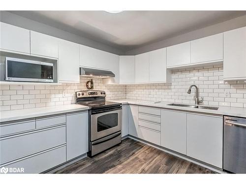 303-131 Clapperton Street, Barrie, ON - Indoor Photo Showing Kitchen With Stainless Steel Kitchen With Double Sink With Upgraded Kitchen