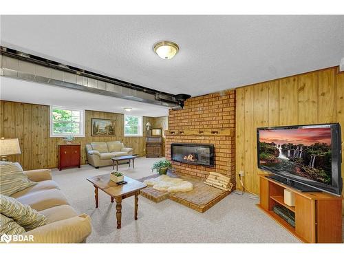 13 Jardine Crescent, Creemore, ON - Indoor Photo Showing Living Room With Fireplace