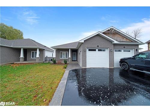 218 Elora Street, Minto, ON - Outdoor With Facade