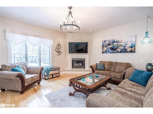 128 Wildwood Trail, Barrie, ON - Indoor Photo Showing Living Room With Fireplace