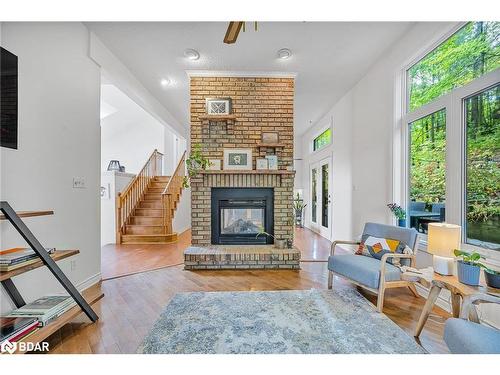 8 Frid Boulevard, Midhurst, ON - Indoor Photo Showing Living Room With Fireplace