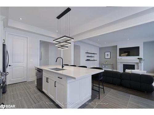 3173 Millicent Avenue, Oakville, ON - Indoor Photo Showing Kitchen With Fireplace With Double Sink