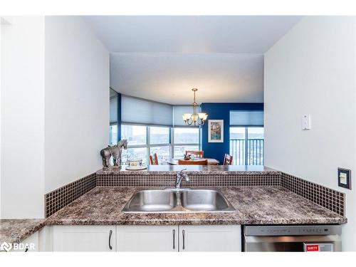 1502 W-140 Dunlop Street E, Barrie, ON - Indoor Photo Showing Kitchen With Double Sink