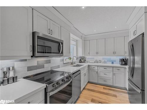 38 Fatima Court, Wasaga Beach, ON - Indoor Photo Showing Kitchen With Stainless Steel Kitchen With Double Sink