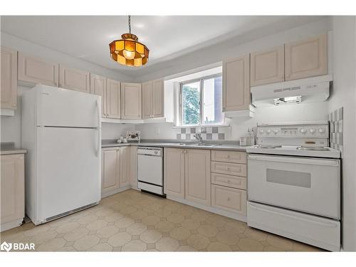 55 Laurel Avenue, Toronto, ON - Indoor Photo Showing Kitchen With Double Sink