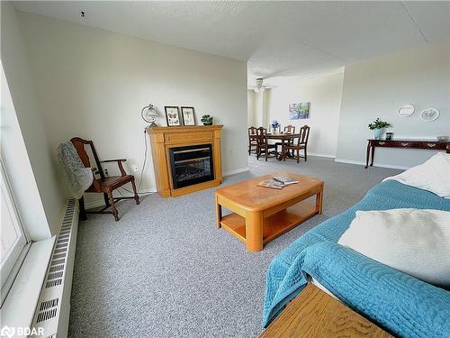 702-414 Blake Street, Barrie, ON - Indoor With Fireplace