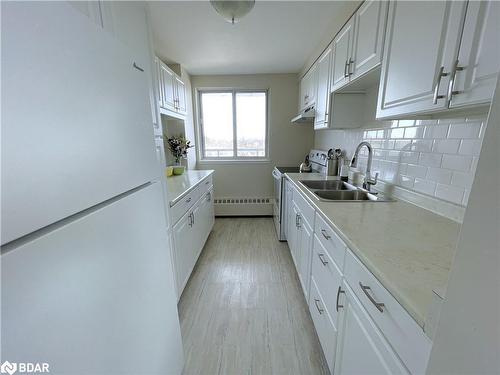 702-414 Blake Street, Barrie, ON - Indoor Photo Showing Kitchen With Double Sink