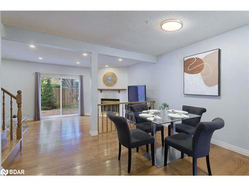 34-800 Upper Paradise Road, Hamilton, ON - Indoor Photo Showing Dining Room With Fireplace