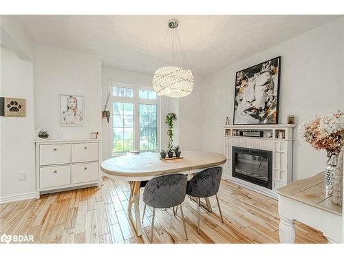11 Oakmont Avenue, Horseshoe Valley, ON - Indoor Photo Showing Dining Room With Fireplace