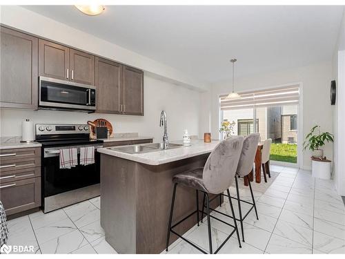 128 Whithorn Crescent, Haldimand, ON - Indoor Photo Showing Kitchen With Stainless Steel Kitchen With Double Sink