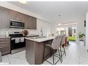 128 Whithorn Crescent, Haldimand, ON  - Indoor Photo Showing Kitchen With Stainless Steel Kitchen With Double Sink 