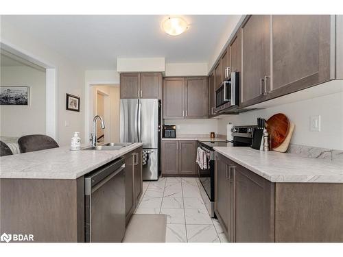 128 Whithorn Crescent, Haldimand, ON - Indoor Photo Showing Kitchen With Stainless Steel Kitchen With Double Sink