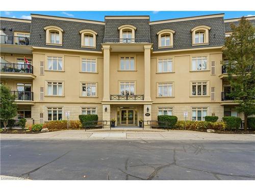 204-443 Centennial Forest Drive, Milton, ON - Outdoor With Balcony With Facade