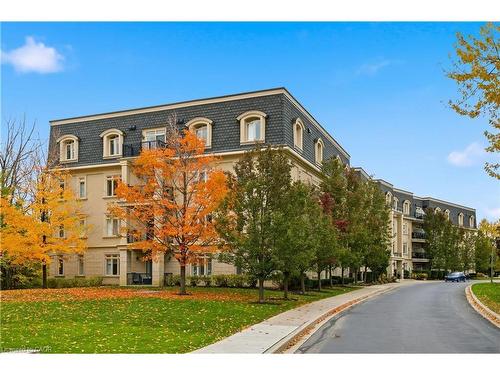 204-443 Centennial Forest Drive, Milton, ON - Outdoor With Facade