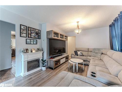 69 Fox Run, Barrie, ON - Indoor Photo Showing Living Room With Fireplace
