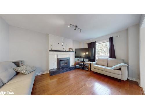 4 Trillium Crescent, Barrie, ON - Indoor Photo Showing Living Room With Fireplace