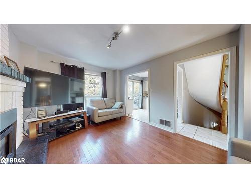 4 Trillium Crescent, Barrie, ON - Indoor Photo Showing Living Room With Fireplace