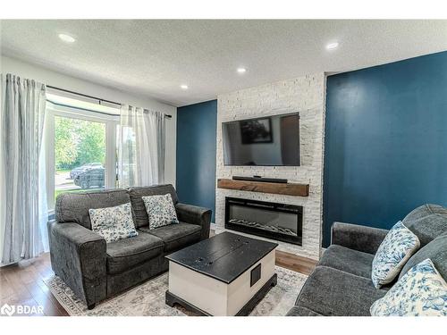 20 Pae Drive, Barrie, ON - Indoor Photo Showing Living Room With Fireplace