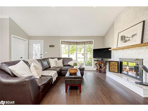 3 Lorne Street, Wellington, ON - Indoor Photo Showing Living Room With Fireplace
