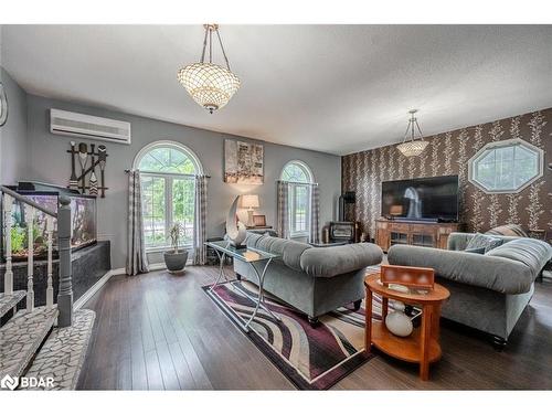 1923 10Th Line, Innisfil, ON - Indoor Photo Showing Living Room With Fireplace