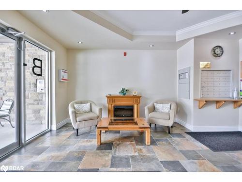 107-19B Yonge Street N, Elmvale, ON - Indoor With Fireplace