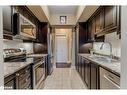 212-44 Ferndale Drive S, Barrie, ON  - Indoor Photo Showing Kitchen With Stainless Steel Kitchen With Double Sink 