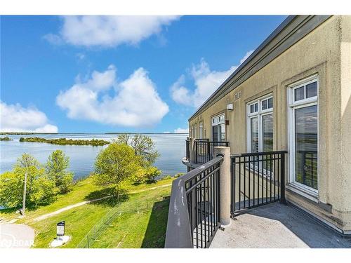 401-140 Cedar Island Road, Orillia, ON - Outdoor With Body Of Water With Deck Patio Veranda With View