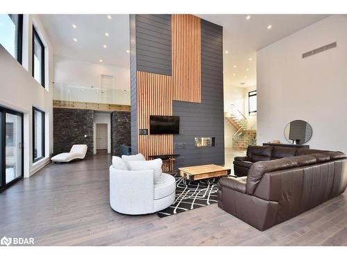 57 Glenhuron Drive, Springwater, ON - Indoor With Fireplace